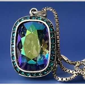 Touchstone Crystal Silver Necklace with Blue-Green Pendant.